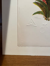 Load image into Gallery viewer, Close-up of a print with embossed letters and a signature on a wooden surface.