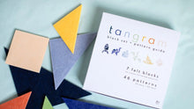 Load image into Gallery viewer, Tangram block set with pattern guide on a light blue background