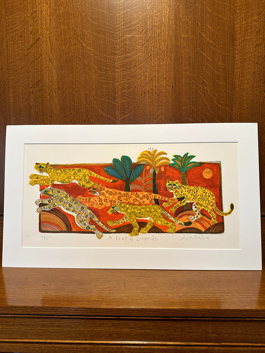 Artistic depiction of leopards on a decorative background with a wooden surface.